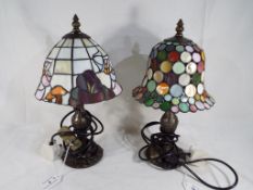 Two Tiffany style table lamps, tallest being 36 cm, shortest 35 cm.