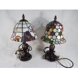 Two Tiffany style table lamps, tallest being 36 cm, shortest 35 cm.