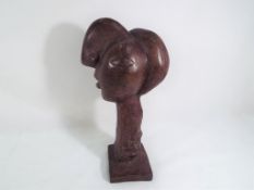 A bronze Picasso style bust, 25 cm (h).