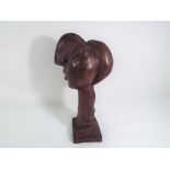 A bronze Picasso style bust, 25 cm (h).