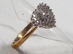 A lady's 9 carat gold 25 point 1/4 carat diamond set cluster ring, approx 2.