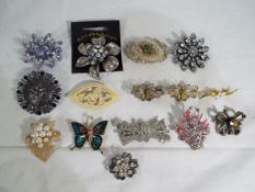A collection of 15 good quality brooches of various styles This lot MUST be paid for and collected,