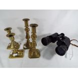 Two pairs of brass candlesticks,