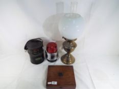 A good lot to include an oil lamp approx 50 cm height, white glass shade, small wooden trinket box,
