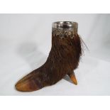 A spill pot in the form of a boar's foot, approximate height 12.5 cm (h).