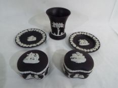 Wedgwood - Five pieces of Wedgwood Jasperware decorated in the black and white matte finish.