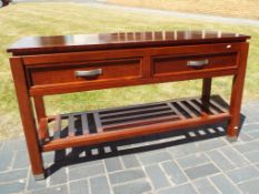 A console table, approximately 77 cm (h) x 137 cm x 46 cm This lot MUST be paid for and collected,