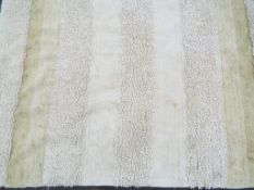 Rug - a good quality modern rug, neutral colours,