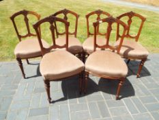 A set of six Victorian dining chairs on