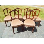 A set of six Victorian dining chairs on