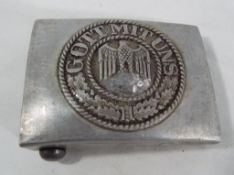 A belt buckle with German emblem. Estima