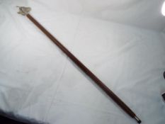 A good quality walking stick with a whit