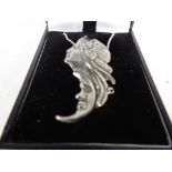 Arts and Crafts - an Arts and Crafts style lady's pendant on a silver necklace, boxed.