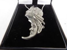 Arts and Crafts - an Arts and Crafts style lady's pendant on a silver necklace, boxed.