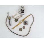 A vintage collection of costume jewellery to include a white metal enamelled brooch,