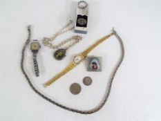 A vintage collection of costume jewellery to include a white metal enamelled brooch,