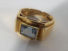 A lady's yellow gold gold ring stamped .750 (indicating 18 carat) set with aquamarine, approx 7.