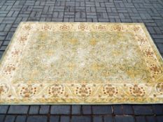 An Opulence 100% viscose fabric carpet / rug with a traditional floral design made in Egypt,