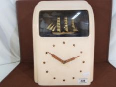 A Vitascope Industries Ltd bakelite cased electric ship automaton clock,