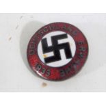 A German enamelled badge marked 1933.