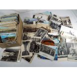 Approximately 800 early and modern UK, foreign and subject postcards.