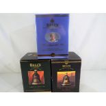 Bells Old Scotch Whisky - three commemorative decanters containing 8 and 12 year old extra special