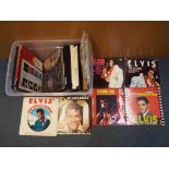 Elvis - A quantity of 33 rpm vinyl records and CD's by Elvis Presley to include Greatest Hits,