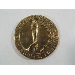 A Devonshire Regiment Second Battalion Athletics Meeting medal dated 1946.