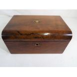 A 19th century mahogany writing box, with inlaid mother-of-pearl decoration to the top,
