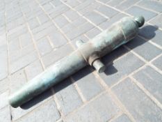 An ornamental cannon, overall length 80 cm x 26 cm, diameter of bore approx 5 cm,
