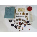 A mixed lot to include a Royal Air Force service and release book, a quantity of vintage buttons,