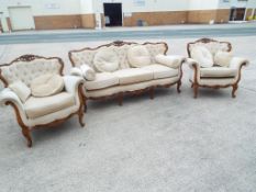 A three piece reproduction French lounge suite (92 cm x 200 cm 82 cm) chairs (92 cm x 95 cm 82 cm)