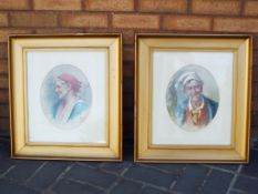 Two pictures, watercolour portraits of a man and a woman,
