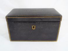 Knowsley - (local interest) - a desk tidy, black leather with gilded borders,