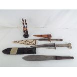 Three tribal knives to include a Maasai example and similar