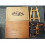 A wooden artist's case containing a quantity of paints and art equipment, a camera bag,