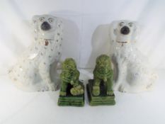 A matched pair of large fireside dogs and a pair of Foo dogs (4)