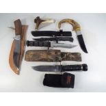 Seven knives to include horn handled examples,