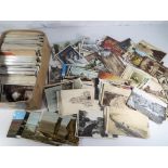 In excess of 500 early to mid-period UK and topographical postcards covering a good range of topics