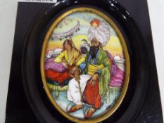 A continental oval hand-painted ceramic plaque signed by the artist,