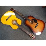Two acoustic guitars one by Encore model #EN155SB the other a Herald model #HL44 (2) This lot