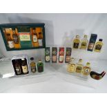 Scotch Whisky - A collection of twenty miniature / taster bottles of Scotch Whisky,