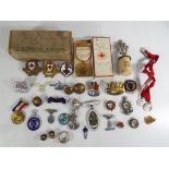 A WWI period British Red Cross Society medal for War Service 1914 - 1918, other Red Cross badges,