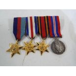 Four World War Two (WW2) miniature medals.