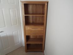 Oak Furniture Land - a tall bookcase,
