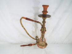A good quality vintage glass and brass hookah pipe, with hand painted floral decoration to the base.