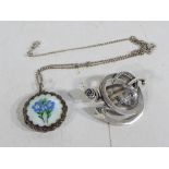 A silver guillache enamelled floral locket set with marcasite and chain and a vintage Ola Gorie