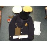 A blazer bearing a patch marked Royal Marine Commando, military caps, gloves,