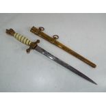 A World War II (WW2) German KriegsmarineNaval Officer's Dagger with a brass scabbard with