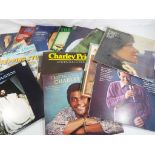 Approximately 25 vinyl record albums, Andy Williams, Charlie Pride,